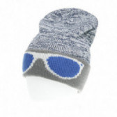 плетена шапка за момче с декорация очила Benetton 58420 
