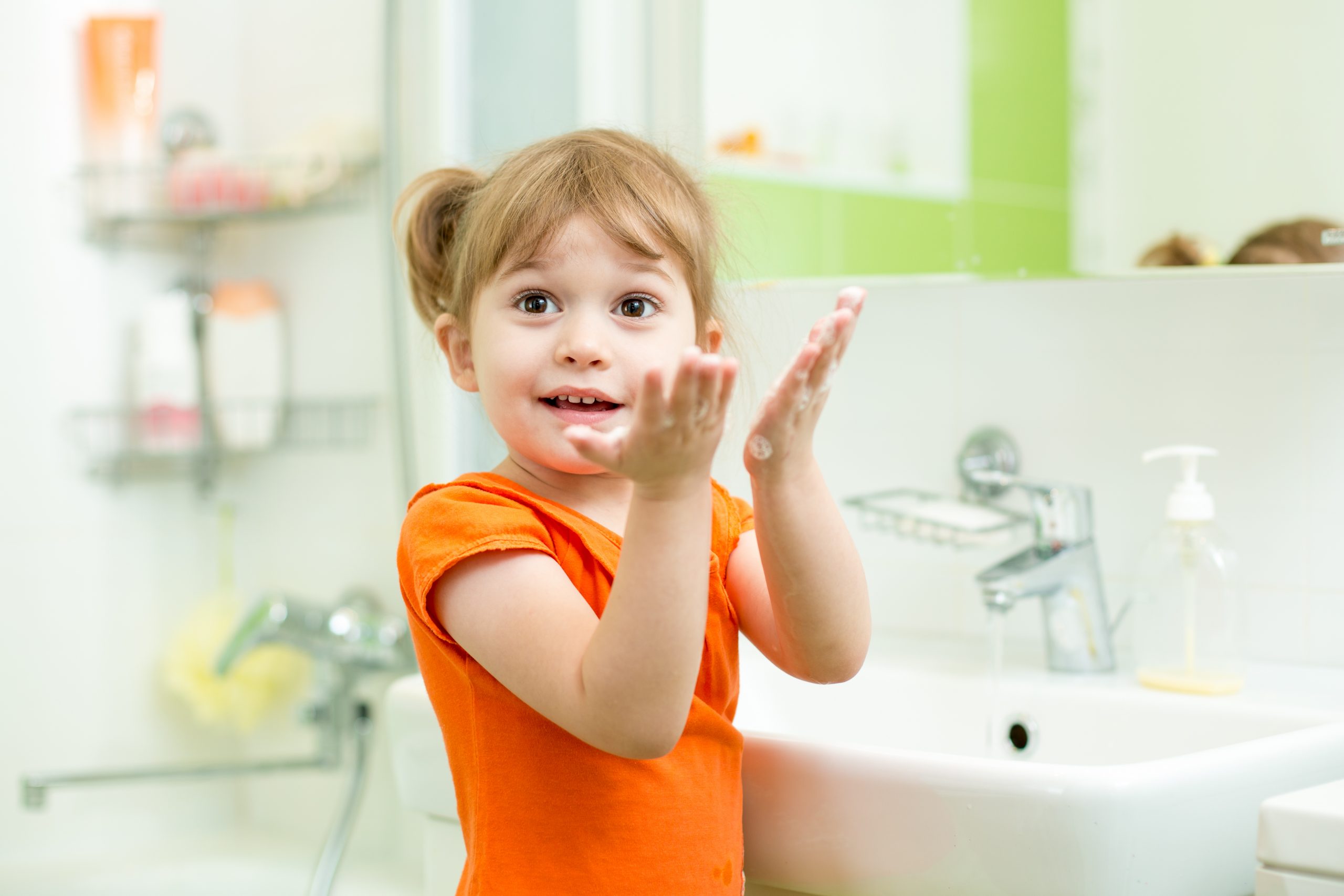 Cute,child,girl,washing,hands,in,bathroom