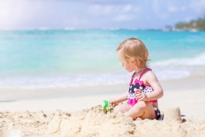 Adorable,little,baby,at,tropical,beach,on,vacation